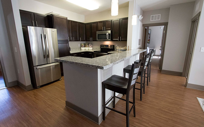 Apartment kitchen with bar seating
